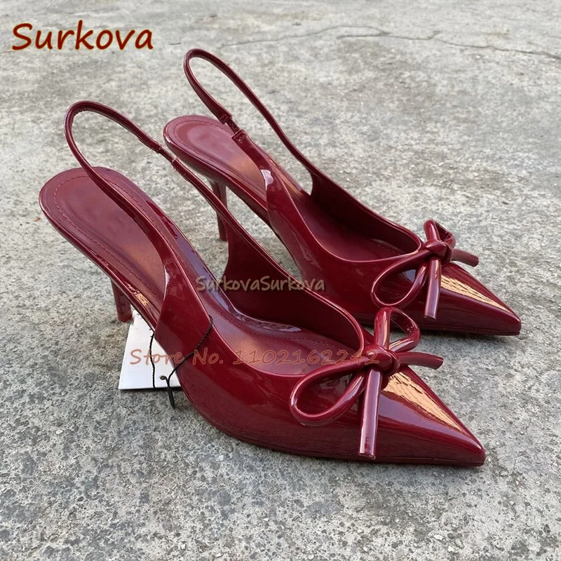 Бордовые туфли-лодочки из лакированной кожи с бантом на высоком каблуке острым