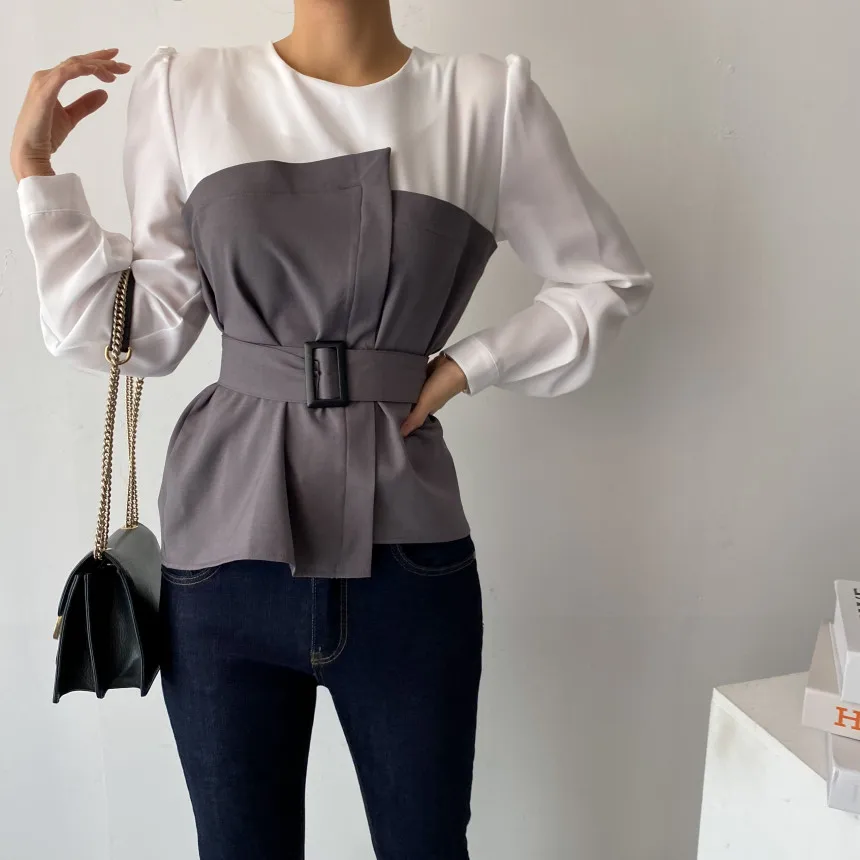 

Design sense splicing fake two waist waist waist waist shirt women early autumn niche thin everything with long sleeve chic top