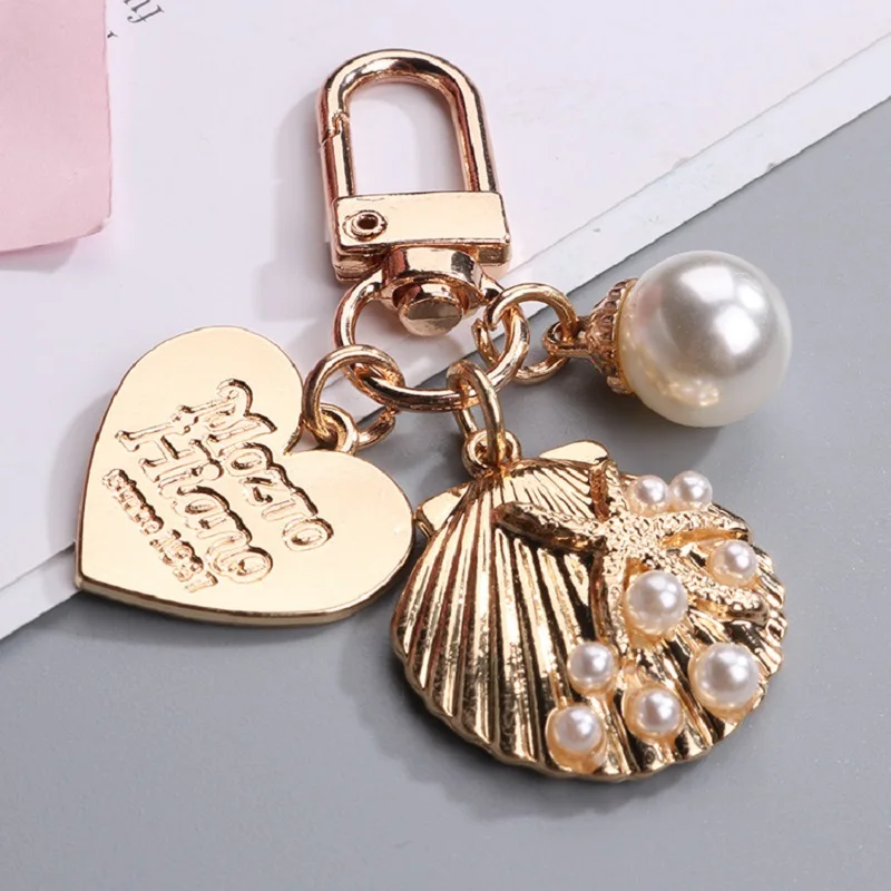 

Creative Peach Heart Shell Keychain Small Gift Bag Pendant Lovely Earphone Pendant Metal Car Keyring Bag Ornament Charms