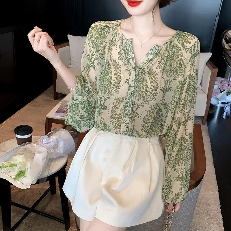 

2023Spring Summer Retro Slim French Style Unique Beautiful Fragmented Lantern Sleeves Loose Chiffon Sunscreen Shirt Women's Tops