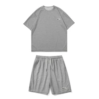sports suit 2022waffle summer new loose leisure suit young male studenttt shirt shorts two piece set