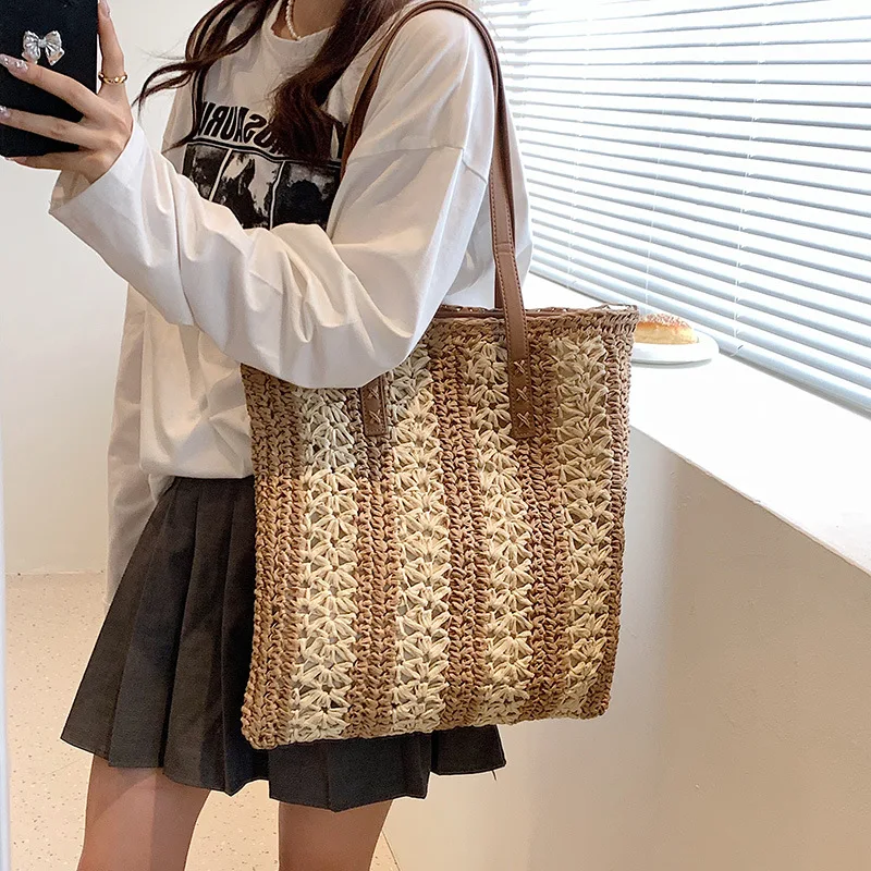 

2022 Summer new beach woven hollow stripe contrast color ladies shopping bag women's one-shoulder messenger bag
