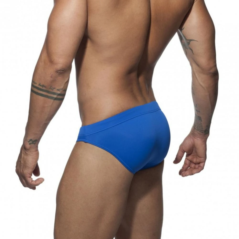 Men's Sexy Briefs Soft Fashion Solid Color Breathable Low Waist briefs Underwear Men's Hips Up Colorful Swimming Trunks