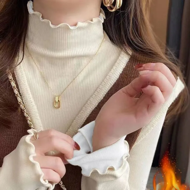 Женские пуловеры с воротником-хомутом и боковой нитью