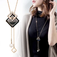 2022 new high quality fashion metal long tassel rhinestone crystal pearl long chain necklace sweater necklace jewelry wholesale