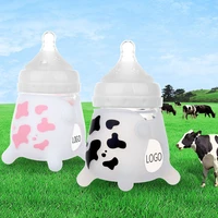 newborn baby milk glass bottle with silicone cover printed handleless glass bottle for mother and baby products