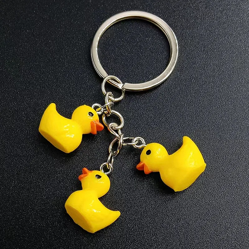 

Cute Little Yellow Acrylic plastic DUCK Key Chain Dancing Duck Keychain Couples Women Friend Gift Bag Pendant Accessory Keyring