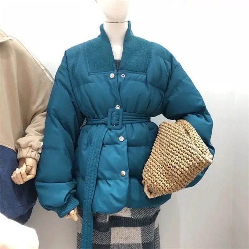 Fashionable Version of The V-neck Winter Waist Waist Waist Warmth Pure Color Wild Loose Belt Jacket Thickened Office Ladies