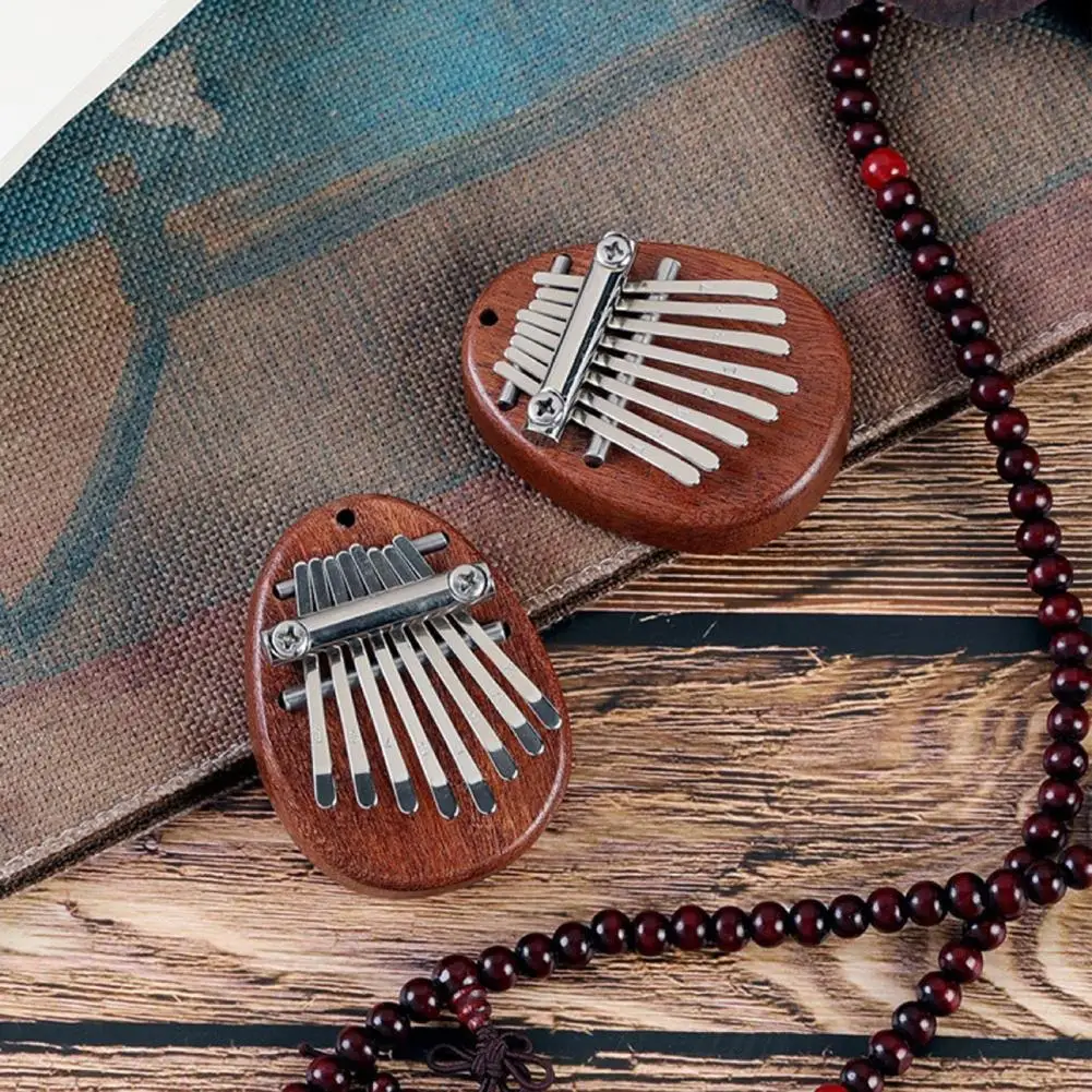 

8 Key Mini Kalimba Exquisite Finger Thumb Piano Marimba Musical Good Accessory Pendant Gift