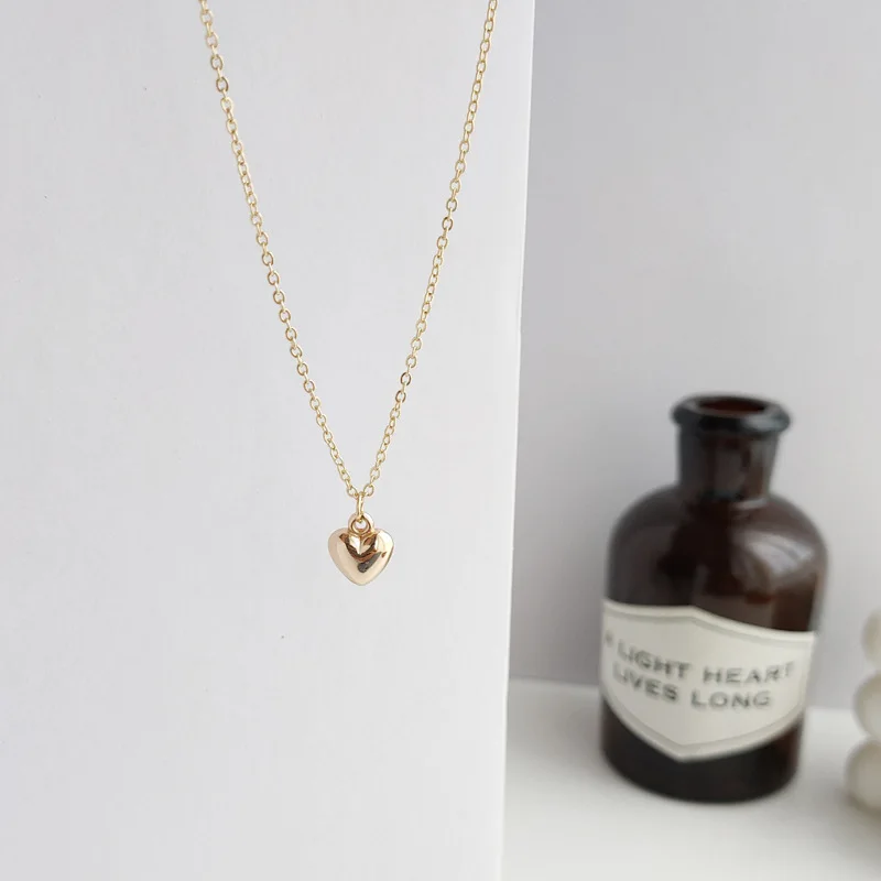 

Fanualoli 2022 New Product Spinning Love Heart Necklace Gold Pendant Necklace For Women Korean Fashion Jewelry For Women Gift