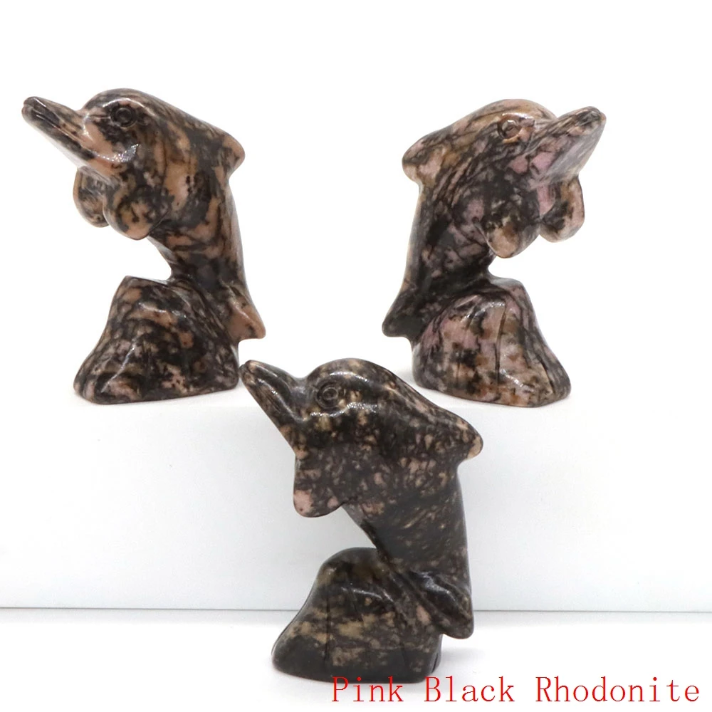 

Статуя дельфина из аметиста и розового кварца