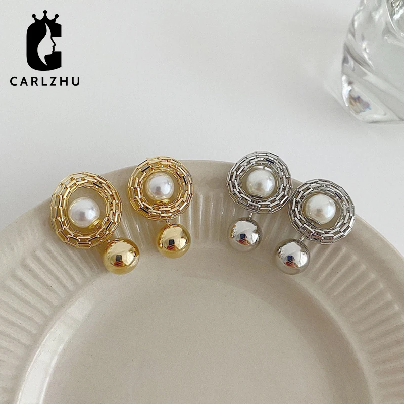 

Серьги-гвоздики геометрической формы с жемчугом, серебро пробы