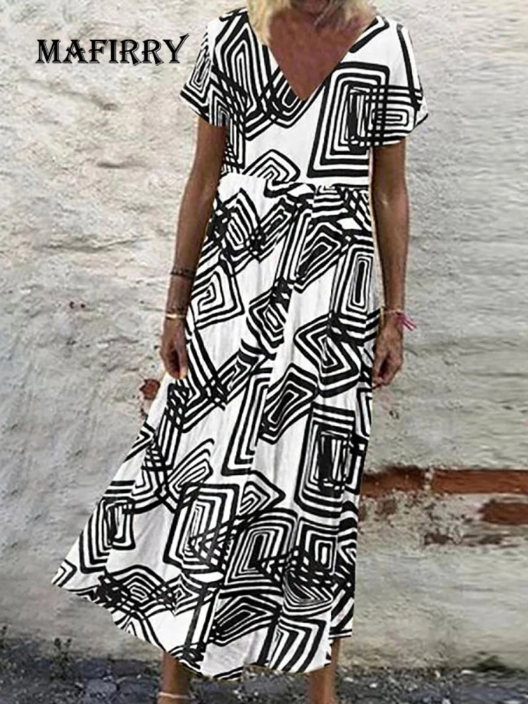 

Женское длинное платье с коротким рукавом и V-образным вырезом