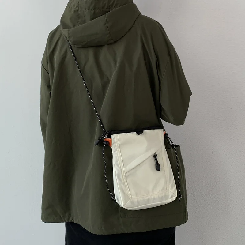 

Модная миниатюрная Водонепроницаемая дорожная сумка в повседневном стиле, маленькая квадратная сумочка на ремне для мужчин и женщин, мессенджер, сумки через плечо унисекс