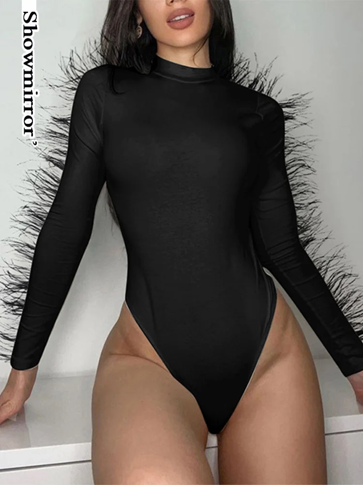 

Водолазка с длинным рукавом и перьями