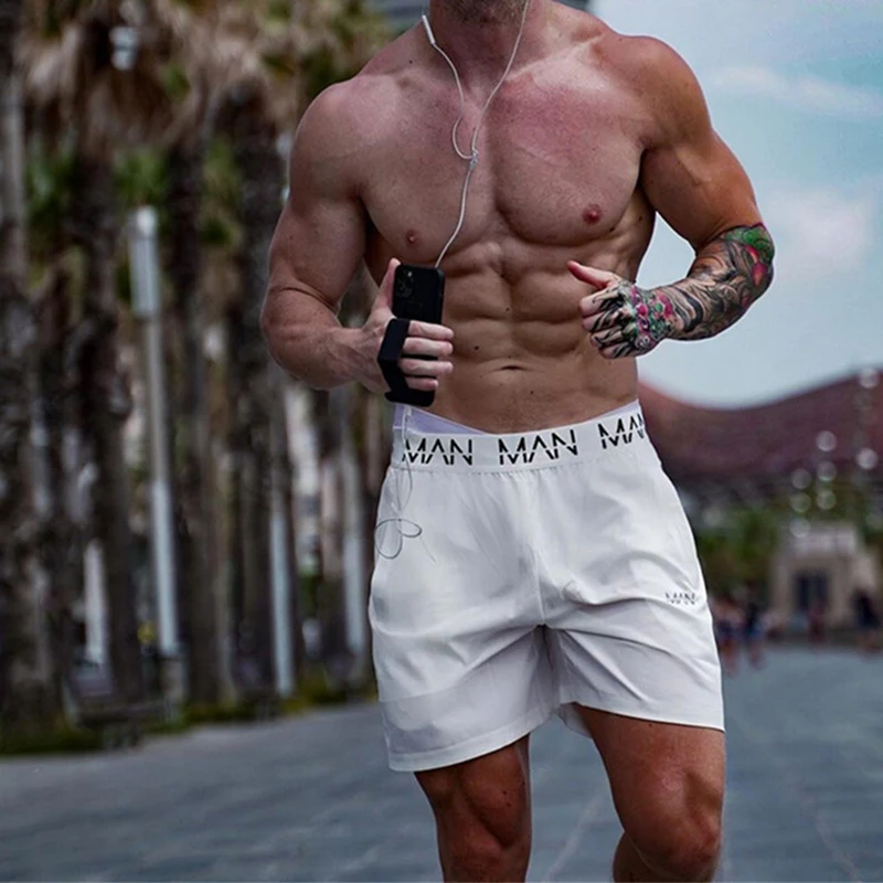 

Men Fitness Bodybuilding Shorts Gyms Workout Male Breathable Quick Dry Sportswear Jogger New Beach Sport Shorts Men's sweatpants
