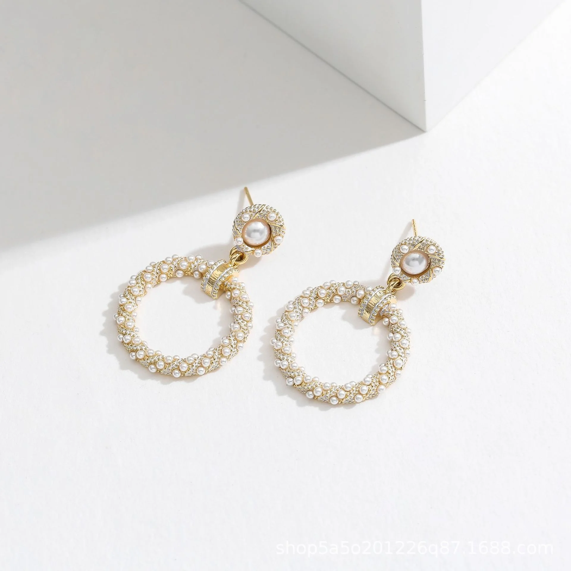 

S925 silver needle high sense fashion pearl earrings female millet beads personalized geometric Earrings hollowed out geometric