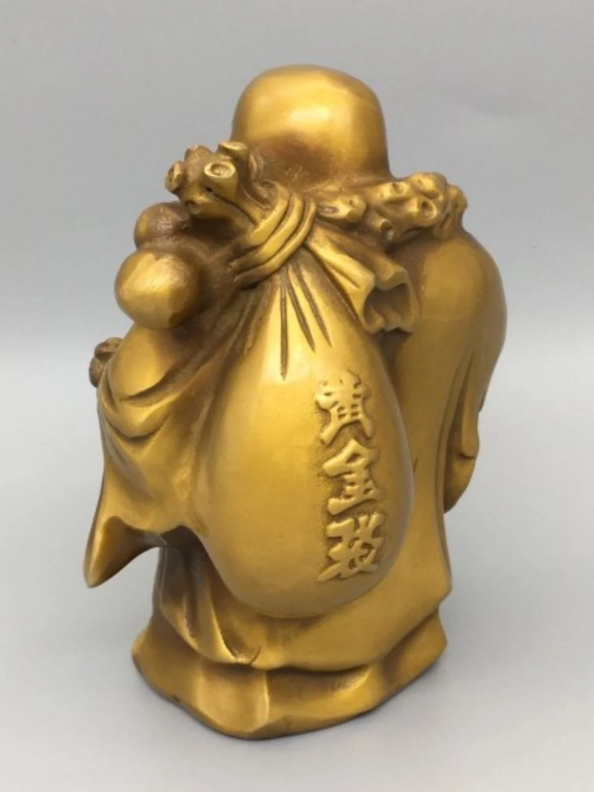 Латунные украшения Maitreya позволяют выбрать деньги отбивать золотые слитки и