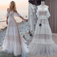 tiered lace boho wedding dress 2022 spaghetti straps deep v neck sexy summer beach wedding dresses cross corset bohemian bride