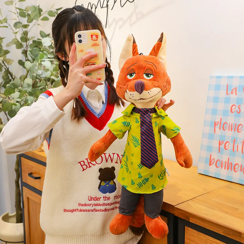Фото Новые плюшевые игрушки Zootopia: кролик Джуди и лиса Ника, мультяшные мягкие игрушки, подарки на детские дни рождения и праздники. №4