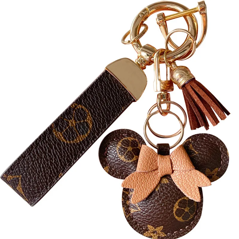 

Disney Kawaii Creative Cartoon Old Flower Mickey Minnie Keychain Female Cute Leather Horseshoe Key Chain Couple Bag Pendant