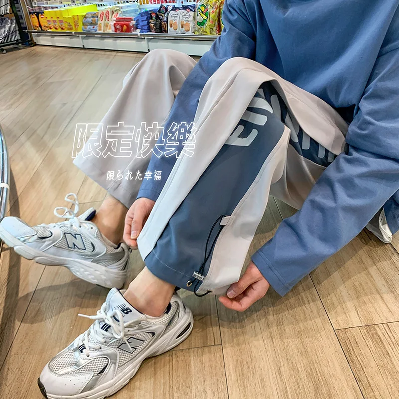 

Hong Kong casual pants men's ins trend new loose leggings 2022 summer clothes Korean fashion color matching sports pants