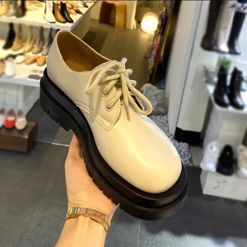 

Round head small leather shoes with thick bottom higher single woman shoes