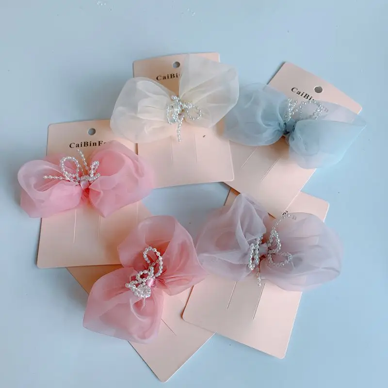 

New spring and summer children's hairpin snow yarn bow cute girl press clip