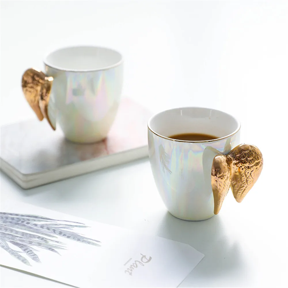 

Creative White Ceramic Mug Gold Plated Handle Angel Wings Office Home Coffee Milk Porcelain Mugs Couple Gift Home Decoration