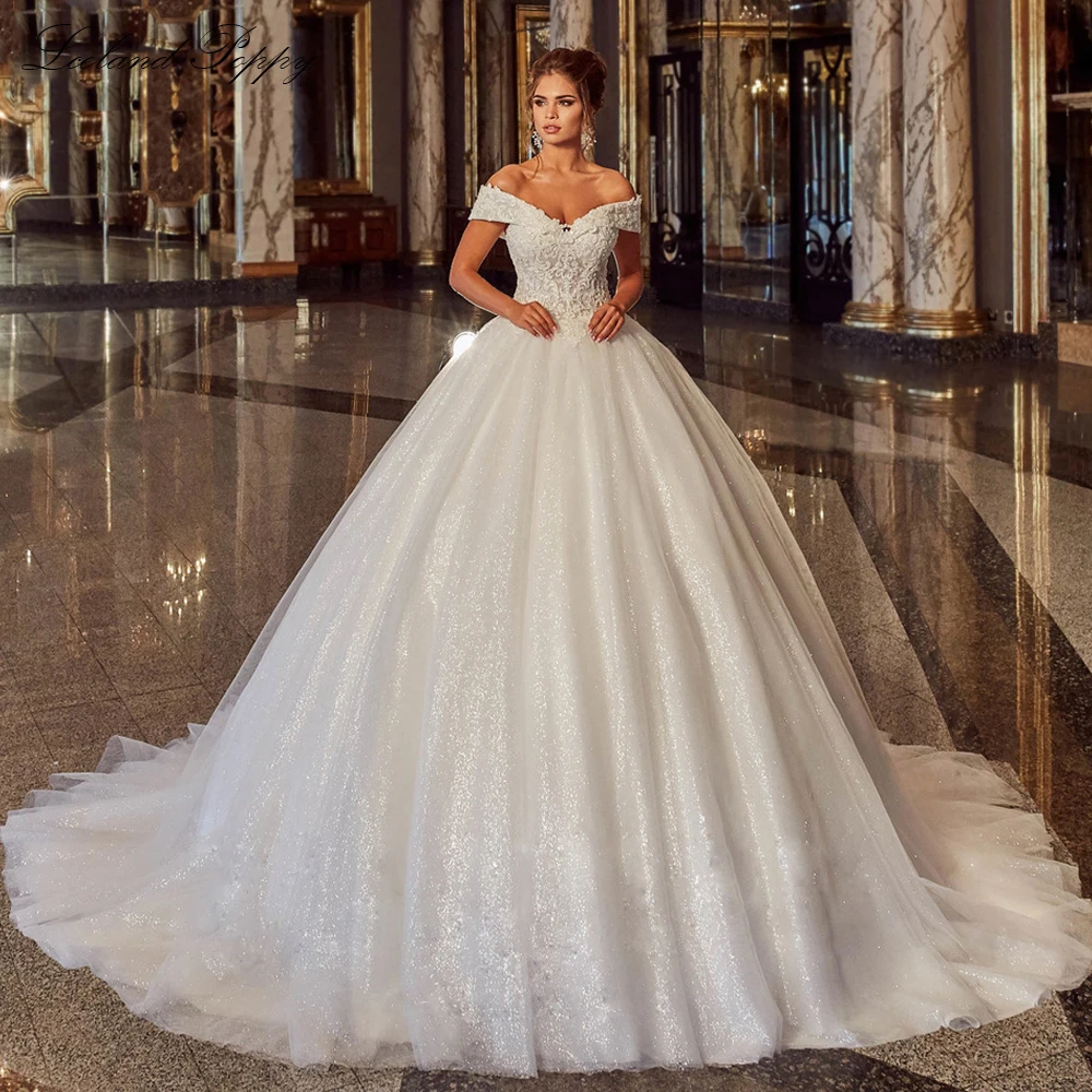 

Lceland Poppy Women's A Line Off the Shoulder V Neck Glitter Tulle Wedding Dresses Floor Length Pearls Beaded Bridal Gowns