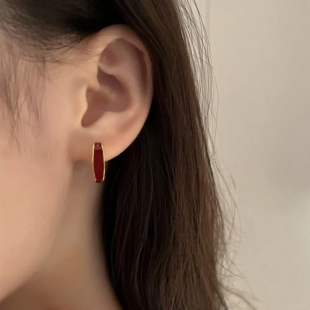 Геометрические серьги цвета красного золота универсальные элегантные для