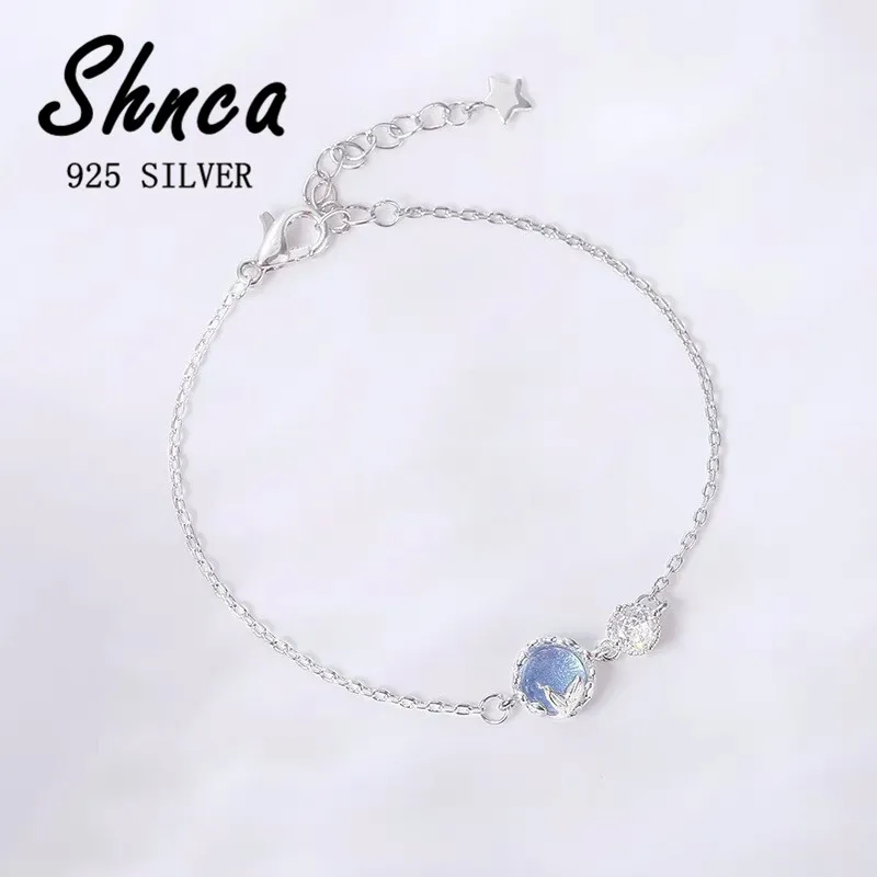 

Женский браслет ручной работы из серебра 925 пробы с голубым кристаллом