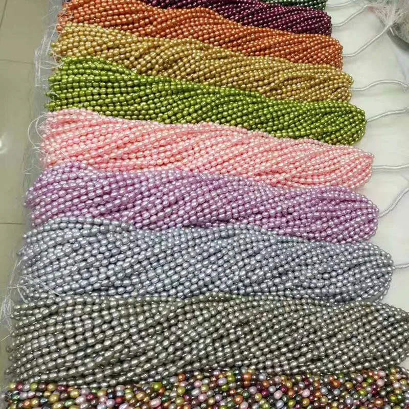 

wholesale 100 strands 5-6mm mix rice freshwater pearl can customized