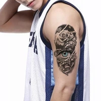 eye of the blue god waterproof temporary tattoo sticker black feather rose fake tattoos flash tatoos arm body art for women men