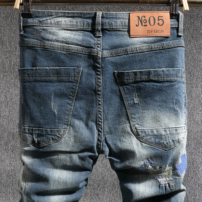 Fashion Designer Men Jeans Slim Fit Retro Blue Patched Ripped Jeans Men Trousers Embroidery Hip Hop Stretch Denim Pants Hombre
