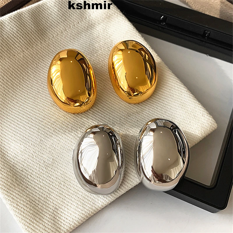 

kshmir Metallic smooth simple large stud female earrings design sense exaggerated temperament attend cocktail earrings