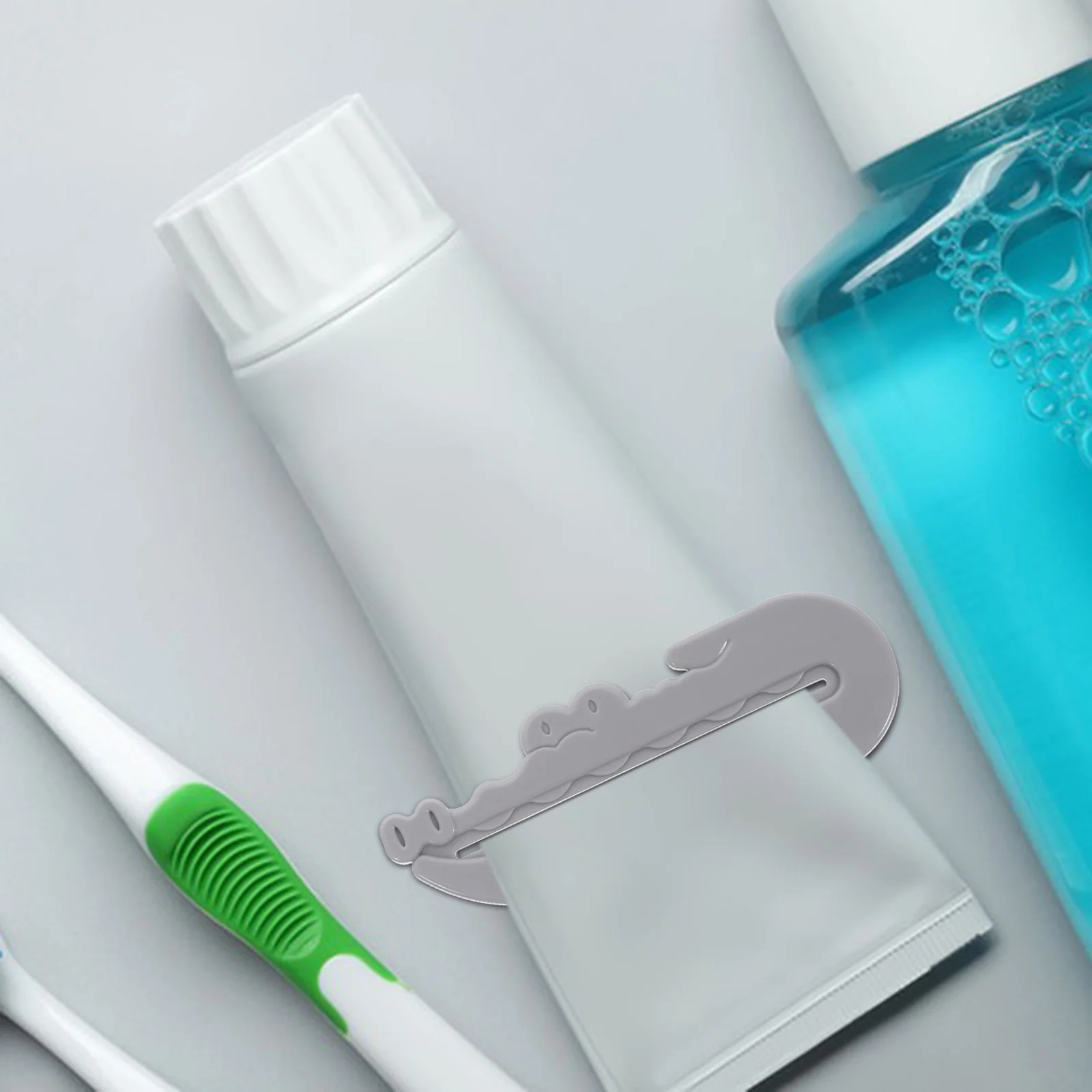 

Toothpaste Squeezer Tube Dispenser Winder Roller Pusher Key Wringer Rolling Holder