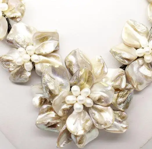 

Wholesale Cheap Classic baroque freshwater cultured pearl shell flower leather weave necklace