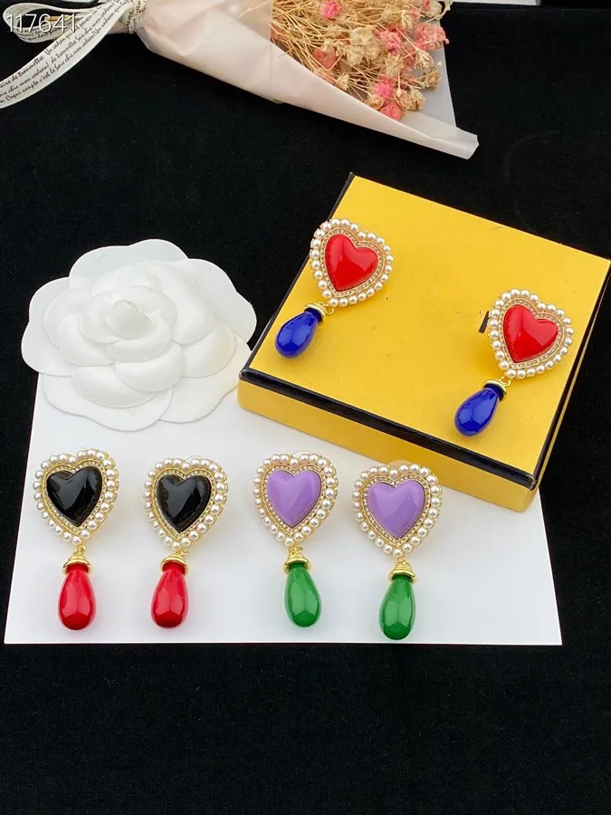 

European and American fashion love water drop two-color Earrings
