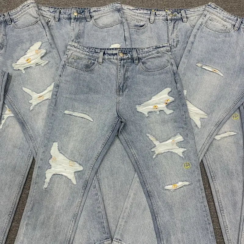 

Streetwear Hip Hop Smiley Face Patch Ripped Jeans Unisex Light Blue Washed Distressed Straight Trousers Men Loose Denim Pants