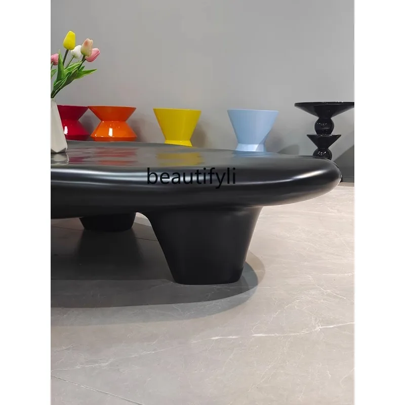 Кофейный столик в нордическом кремовом стиле из камня овальной формы