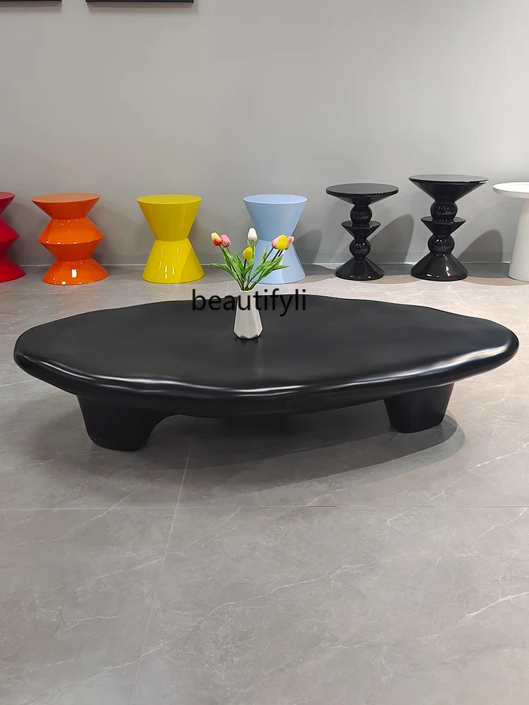 Кофейный столик в нордическом кремовом стиле из камня овальной формы