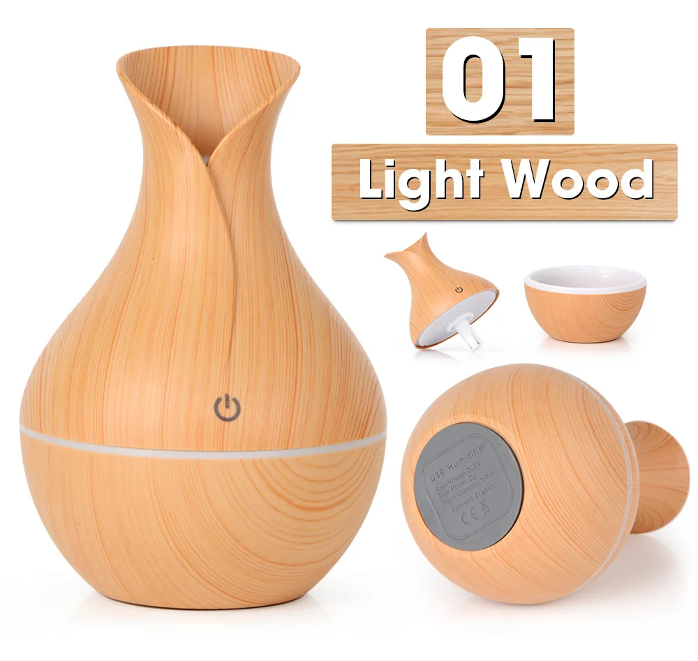 

Source stock 130ml wood grain humidifier LED seven color aromatherapy machine USB water replenisher car home purifier