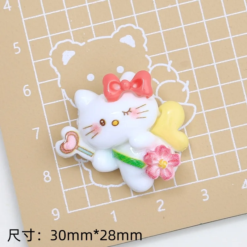 Кабошон из смолы с рисунком Хелло Китти