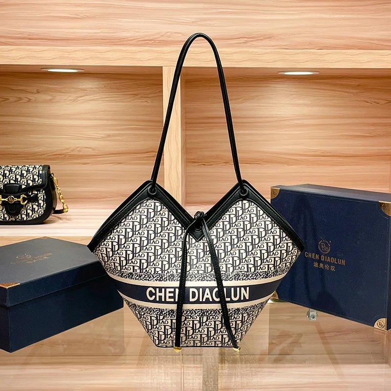 

2023 New Tote bag niche design female bag texture commuter single shoulder Tote bag large capacity irregular large bag A953