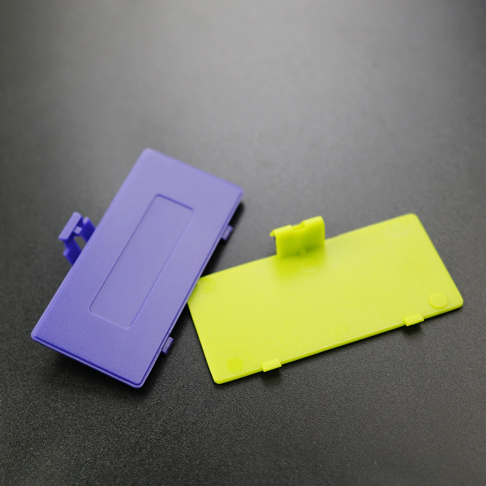 Фото YUXI 1 шт. 8 цветов на выбор, сменная Крышка батарейного отсека для Game Boy Pocket Gameboy GBP, Крышка батарейного отсека №5