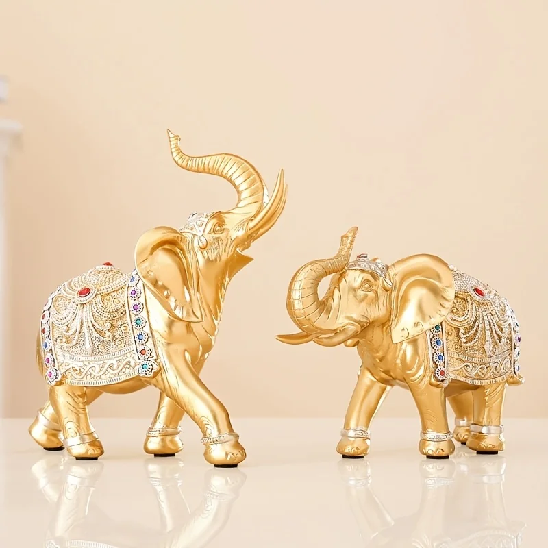 

2 штуки золотых статуй слонов из смолы