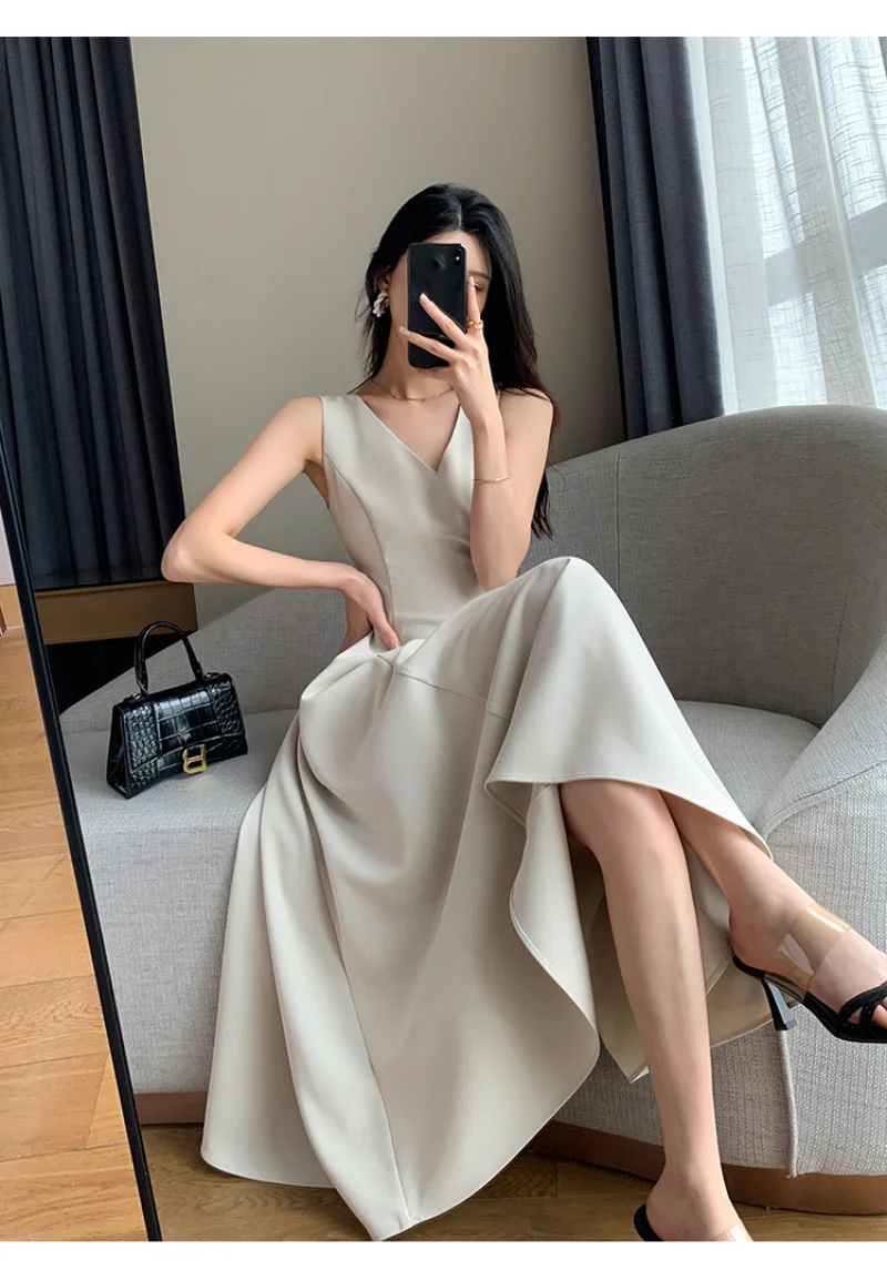 

Temperament Fashion Sleeveless Women's Dresses New Senior Sense of Elegance Goddess Fan Commuter Thin V-neck Simple Long Dresses