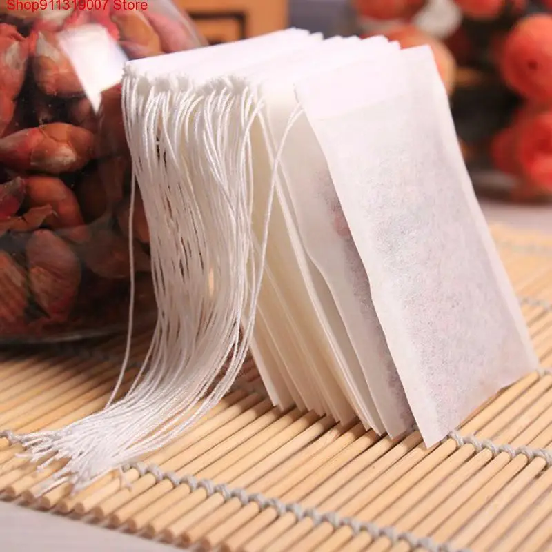 

Hot Sale 100pcs Non Woven Empty Tea Bags String Seal Filter Herb Loose Disposable Tea Bags Convenient Essential Tools F0010