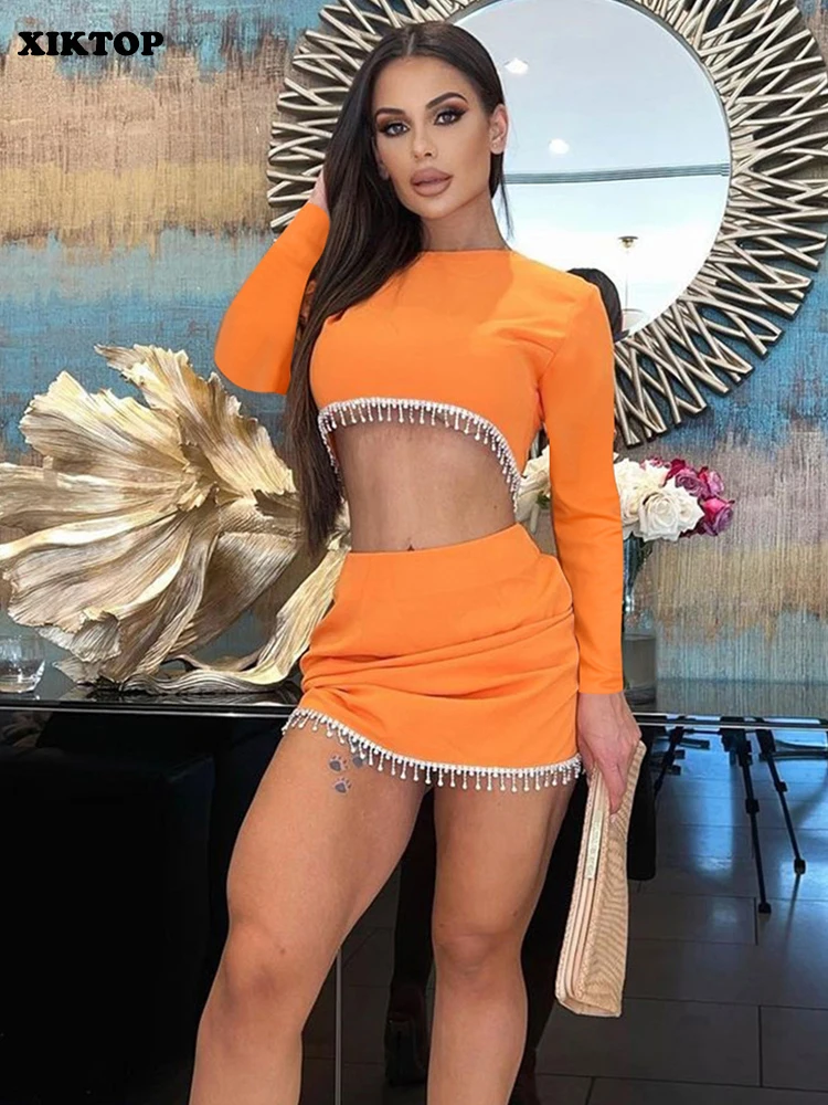 

Женский комплект из 2 предметов XIKTOP с цепочками и юбкой с бахромой, сексуальный укороченный топ с круглым вырезом и однотонная облегающая юб...